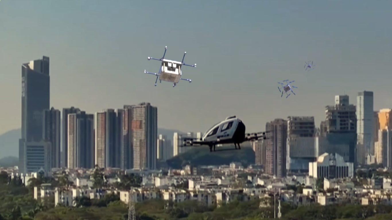 Multiple autonomous drones, including a larger aerial vehicle, flying over a modern city skyline, representing coordinated AI-driven drone operations.
