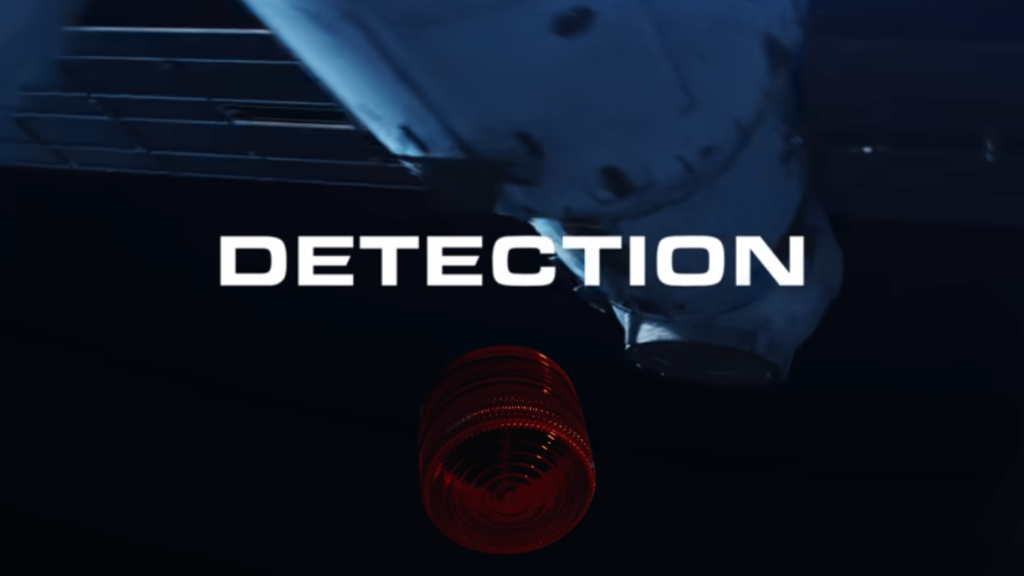 Satellite in space detecting a signal with a red alert indicator, representing nuclear launch detection systems.