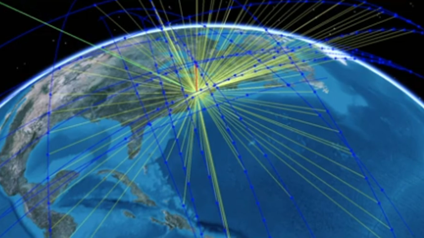 Earth covered by a network of satellite paths and signal beams, illustrating global surveillance and satellite constellation coverage.