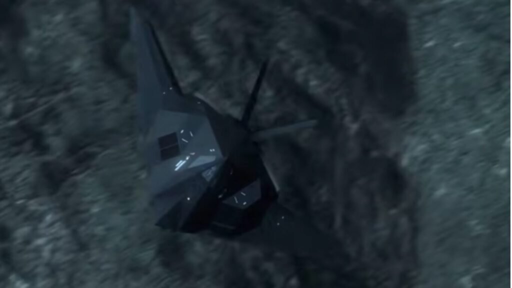 An F-117 Nighthawk stealth aircraft flying low over dark, rugged terrain, showcasing an iconic platform relevant to AI in Stealth Technology.