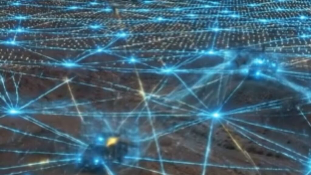 An aerial landscape overlaid with a glowing blue digital mesh network connecting nodes across the terrain, illustrating a Digital Twin Battlefield.