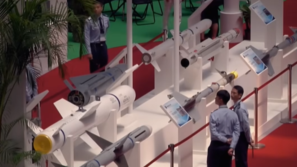 Autonomous weapon systems and guided missiles displayed at defense exhibition with edge computing technologies