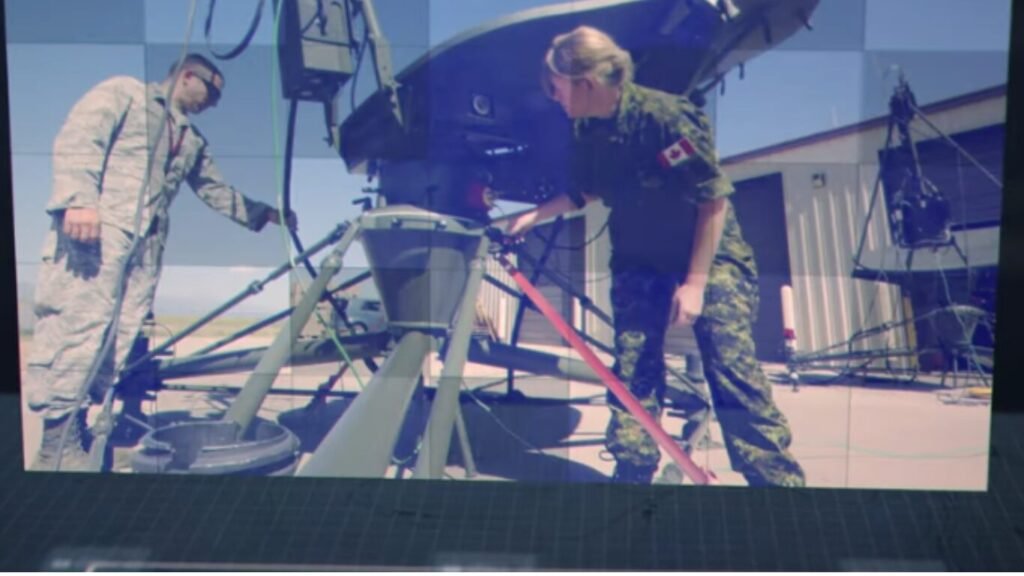 Military personnel inspecting a drone system on a launch pad, highlighting tactical integration for Edge Computing in Autonomous Weapons.