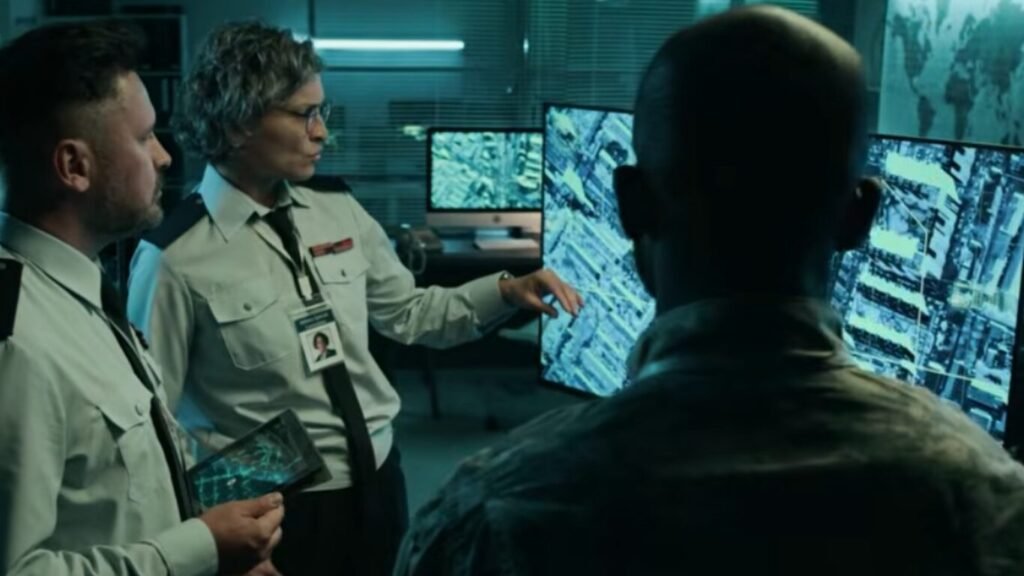 Military intelligence personnel in a command room monitoring digital city grid maps on multiple large display screens, analyzing indicators of Iran Israel Cyber Warfare.