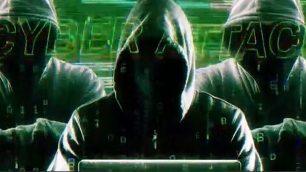 Three anonymous individuals in dark hoodies sitting side-by-side behind laptops with a green "CYBER ATTACK" digital glitch overlay, representing threat actors in Iran Israel Cyber Warfare.