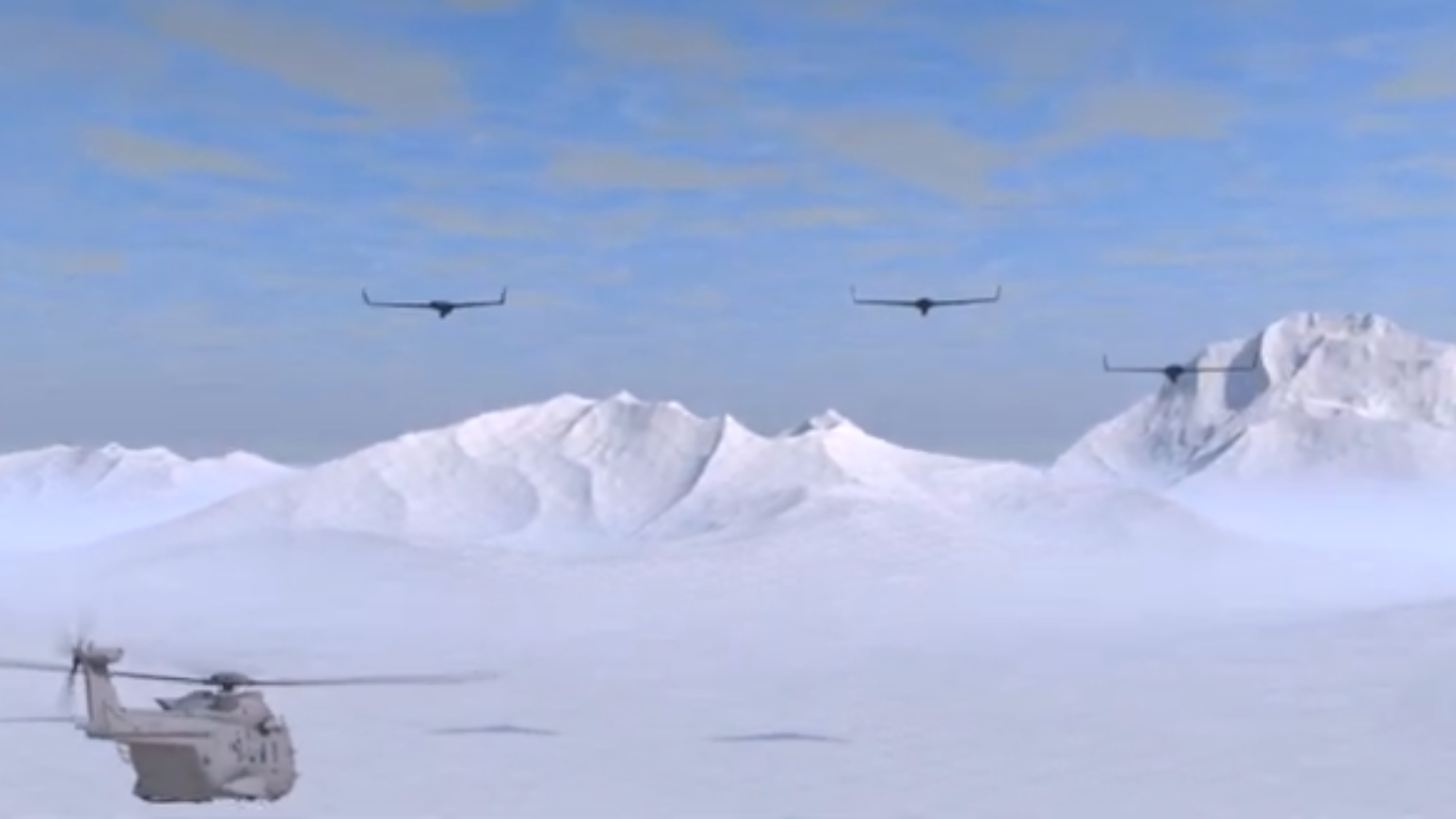 Manned-unmanned teaming with military helicopter and autonomous drones flying over snowy mountains