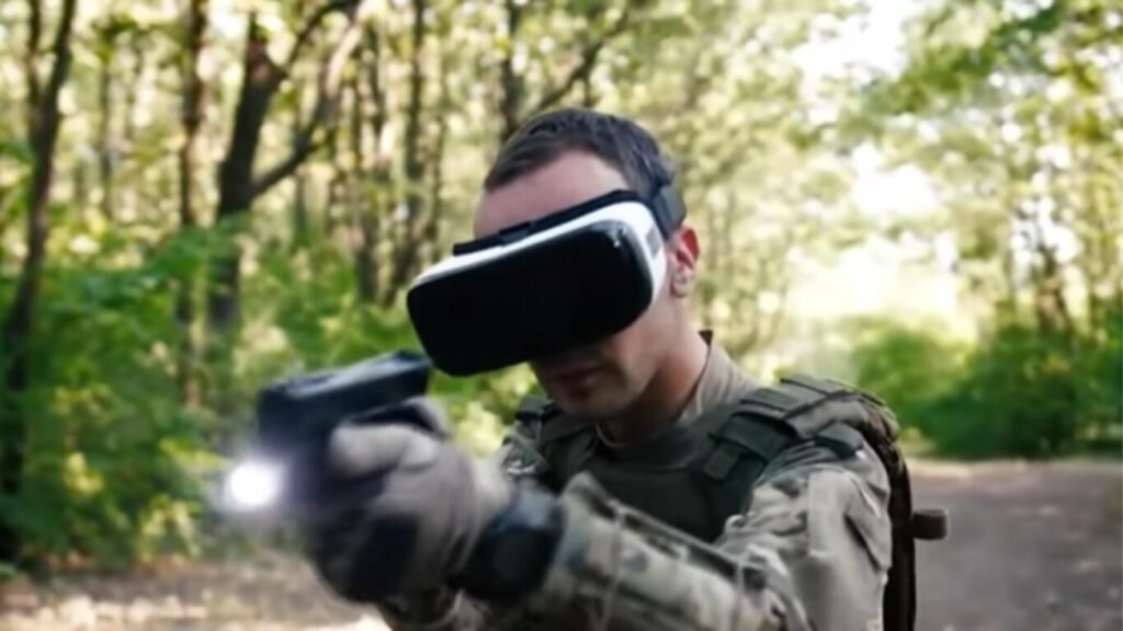 A soldier wearing a VR headset and tactical gear aiming a handgun during an outdoor training exercise integrated with Tactical AI in Defence Operations.