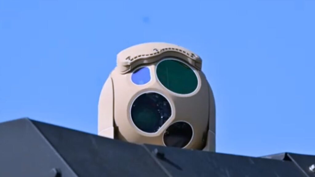 A multi-sensor electro-optical turret mounted on a military platform, showcasing the specialized hardware used to run Target Recognition Algorithms.