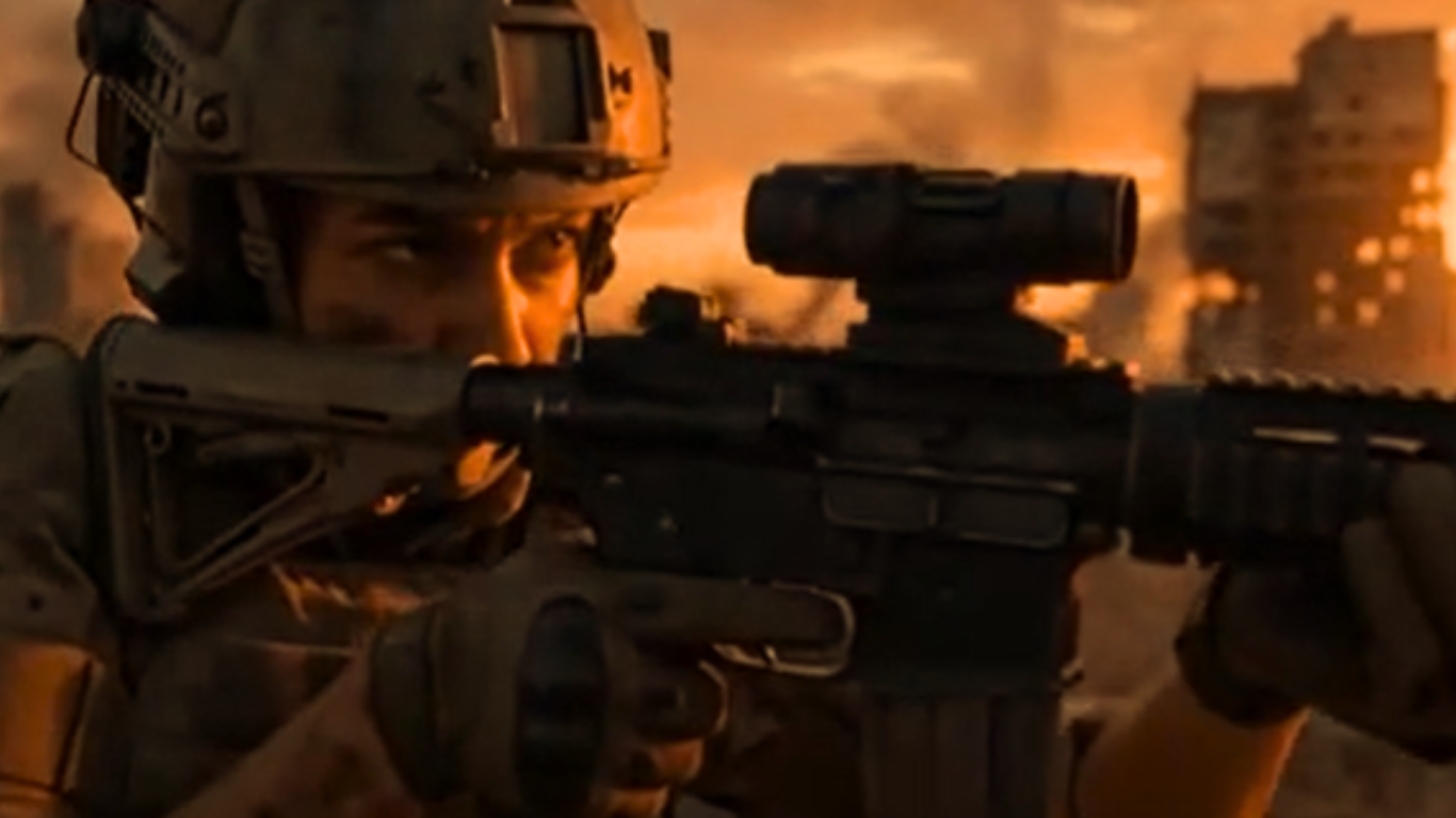 Soldier aiming a rifle with a scope in a war-torn urban environment during sunset.